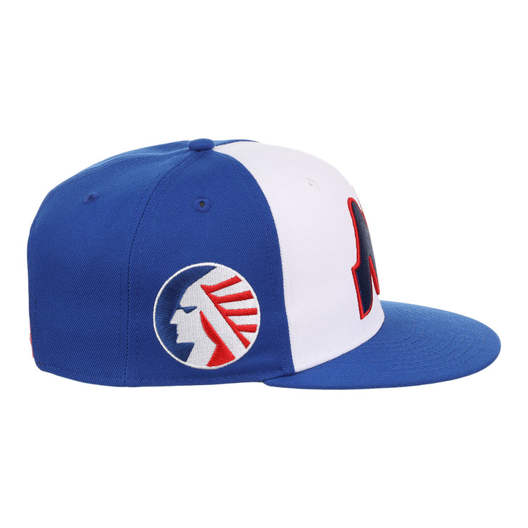 The Memphis Chicks EFF MiLB Vintage Snapback by Ebbets Field Flannels features a blue and white adjustable cap with a blue flat brim and red-and-blue embroidered Native American chief, inspired by the classic Minor League design.