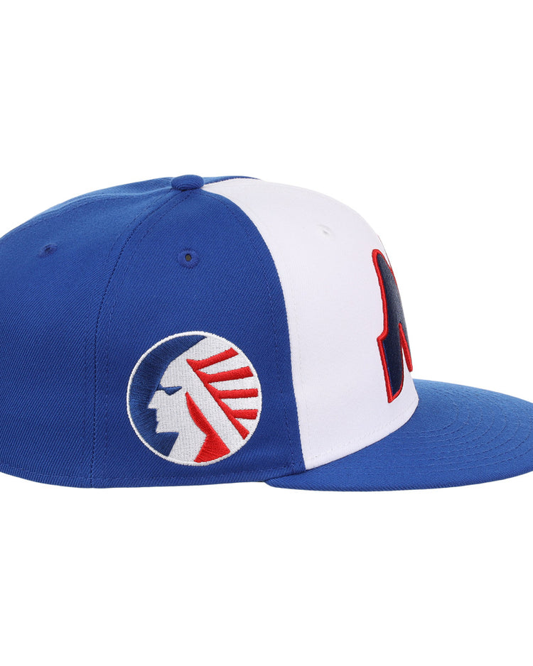 The Memphis Chicks EFF MiLB Vintage Snapback by Ebbets Field Flannels features a blue and white adjustable cap with a blue flat brim and red-and-blue embroidered Native American chief, inspired by the classic Minor League design.