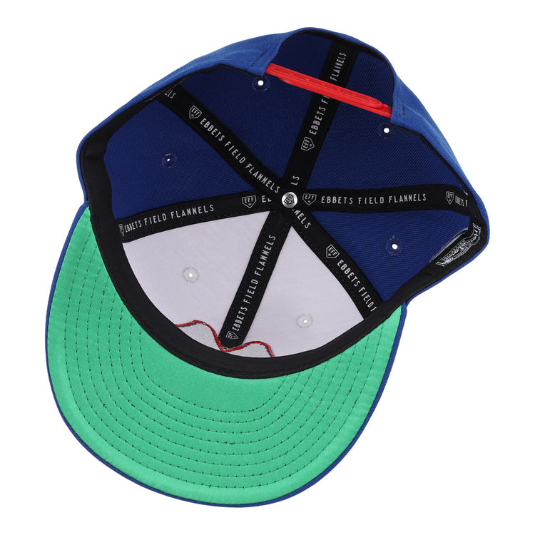 The Memphis Chicks EFF MiLB Vintage Snapback by Ebbets Field Flannels features a green underbrim, black inner bands with “EBBETS FIELD FLANNELS” text, white panels with ventilation holes, and an adjustable snapback for the perfect fit.