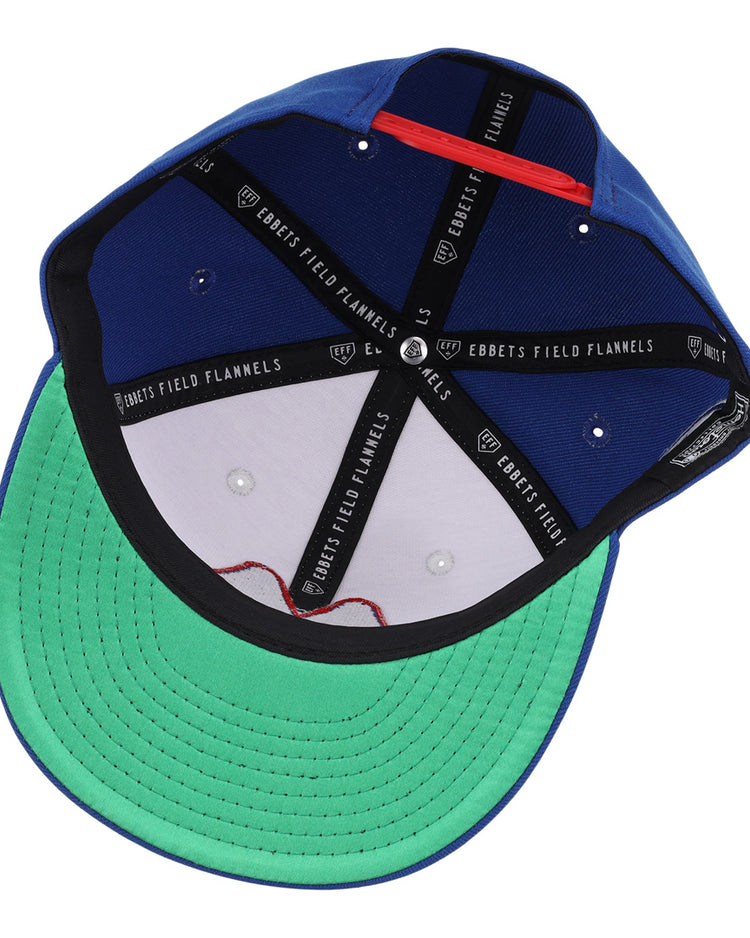 The Memphis Chicks EFF MiLB Vintage Snapback by Ebbets Field Flannels features a green underbrim, black inner bands with “EBBETS FIELD FLANNELS” text, white panels with ventilation holes, and an adjustable snapback for the perfect fit.