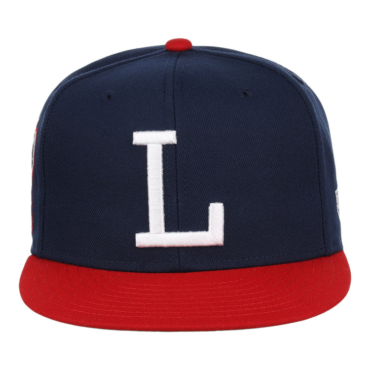 The Louisville Colonels EFF MiLB Vintage Snapback by Ebbets Field Flannels features a navy crown, red brim, white L on the front, and adjustable snapback fit. Part of the Vintage Minor League collection.