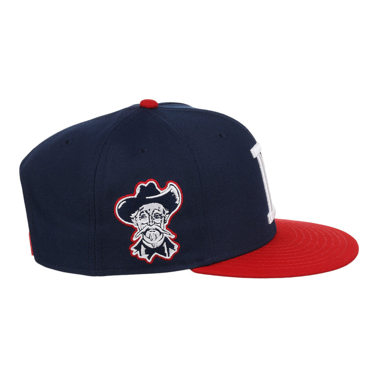 The Louisville Colonels EFF MiLB Vintage Snapback by Ebbets Field Flannels features a navy crown, red brim, white “L” front logo, cartoon cowboy face on the side, and an adjustable snapback from the Vintage Minor League collection.