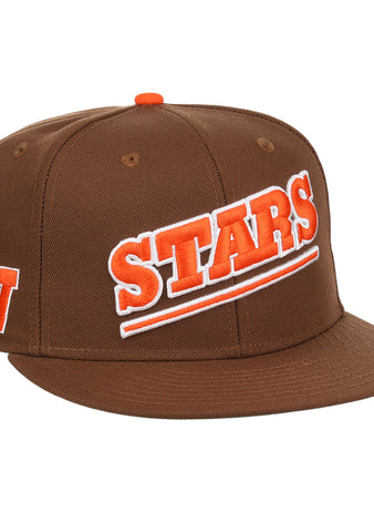 The Ebbets Field Flannels Las Vegas Stars EFF MiLB Vintage Snapback is a brown cap with orange and white embroidered STARS front, orange W logo on the side, orange top button, flat brim, and snapback closure—perfect for vintage style fans.