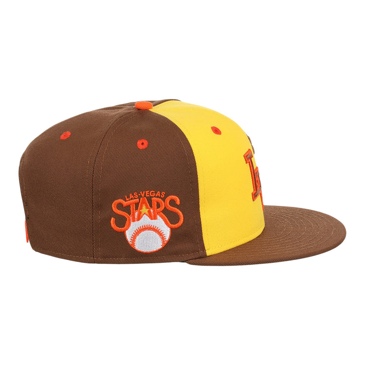 The Las Vegas Stars EFF MiLB Vintage Snapback in yellow by Ebbets Field Flannels features a brown and yellow design with an orange and white embroidered baseball on the side, capturing classic Minor League style.