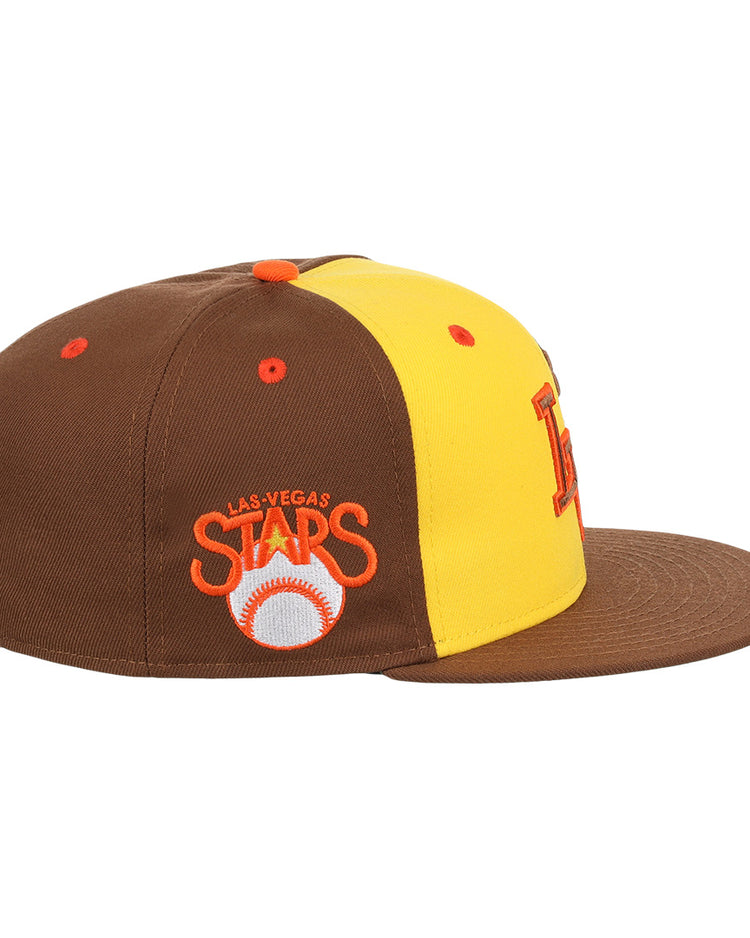 The Las Vegas Stars EFF MiLB Vintage Snapback in yellow by Ebbets Field Flannels features a brown and yellow design with an orange and white embroidered baseball on the side, capturing classic Minor League style.