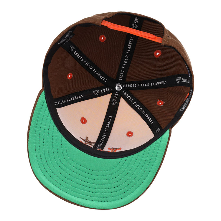The Las Vegas Stars EFF MiLB Vintage Snapback by Ebbets Field Flannels features a yellow design, adjustable fit, orange eyelets, green underside brim, branded black interior strips, and a printed cowboy and horse scene.