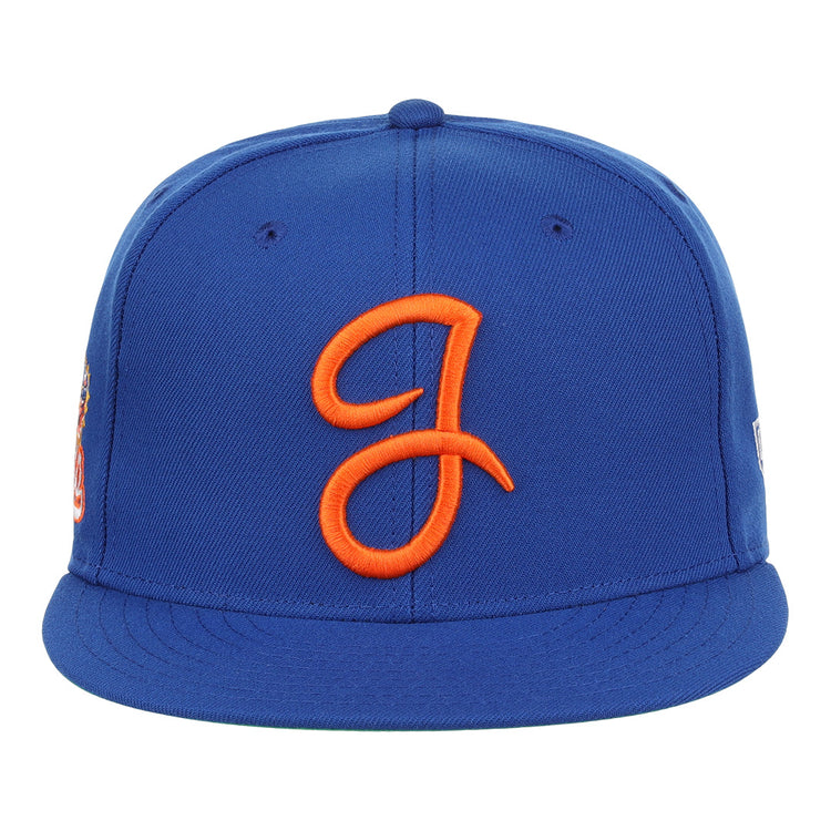The Ebbets Field Flannels Jacksonville Suns EFF MiLB Vintage Snapback is a blue cap with an orange embroidered J logo, flat brim, snapback closure, and visible stitching—offering classic style and adjustable comfort.