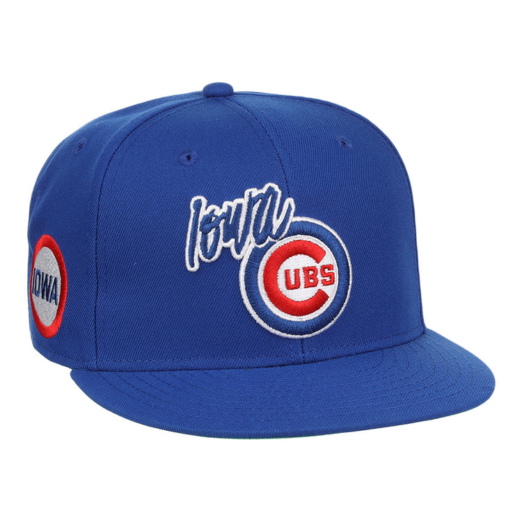 The Iowa Cubs EFF MiLB Vintage Snapback by Ebbets Field Flannels is a blue adjustable cap with Iowa and the Chicago Cubs logo embroidered on the front, plus an Iowa side patch—perfect for vintage minor league fans.