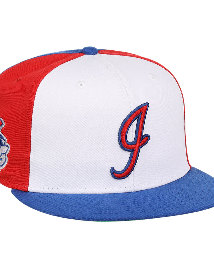 The Ebbets Field Flannels Indianapolis Indians EFF MiLB Vintage Snapback features a white front, red sides, blue brim and button, a stylized red and blue J on the front, and a cartoon baseball character from the Vintage Minor League collection on the side.