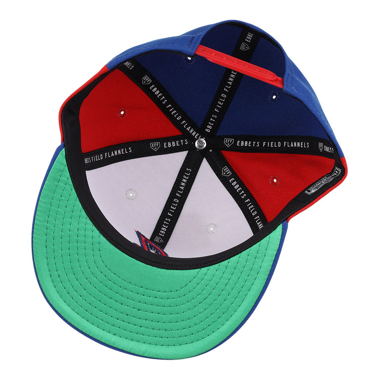 The Indianapolis Indians EFF MiLB Vintage Snapback by Ebbets Field Flannels features a green brim, red and blue panels, snapback closure, black interior taping with branding, and a metal center button—a classic from the Vintage Minor League collection.