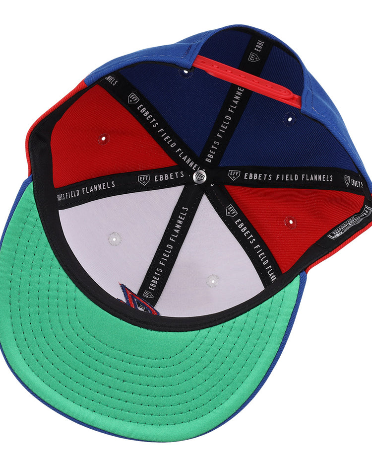 The Indianapolis Indians EFF MiLB Vintage Snapback by Ebbets Field Flannels features a green brim, red and blue panels, snapback closure, black interior taping with branding, and a metal center button—a classic from the Vintage Minor League collection.