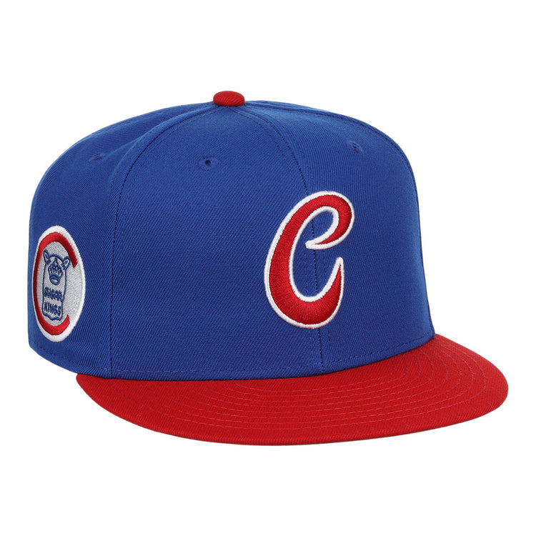 The Havana Sugar Kings EFF MiLB Vintage Snapback by Ebbets Field Flannels features a blue cap with red brim, a red and white C logo on the front, and a circular side patch—part of the Vintage Minor League collection.