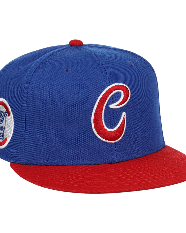 The Havana Sugar Kings EFF MiLB Vintage Snapback by Ebbets Field Flannels features a blue cap with red brim, a red and white C logo on the front, and a circular side patch—part of the Vintage Minor League collection.