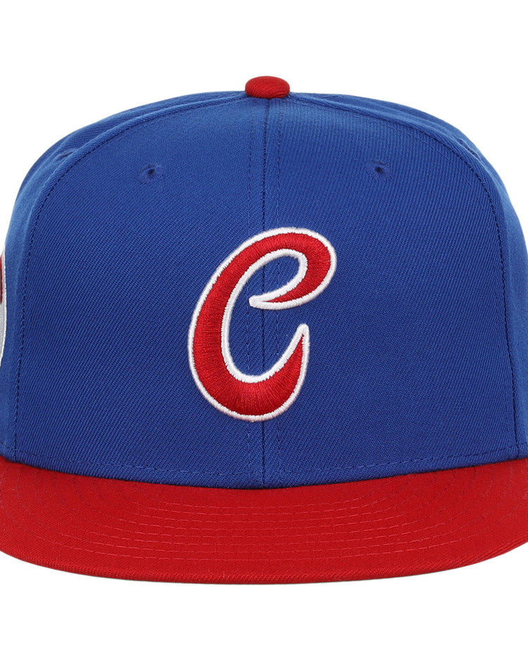 The Havana Sugar Kings EFF MiLB Vintage Snapback by Ebbets Field Flannels features a blue crown, red brim, and a white and red embroidered C on the front, inspired by the International League baseball Vintage Minor League collection.