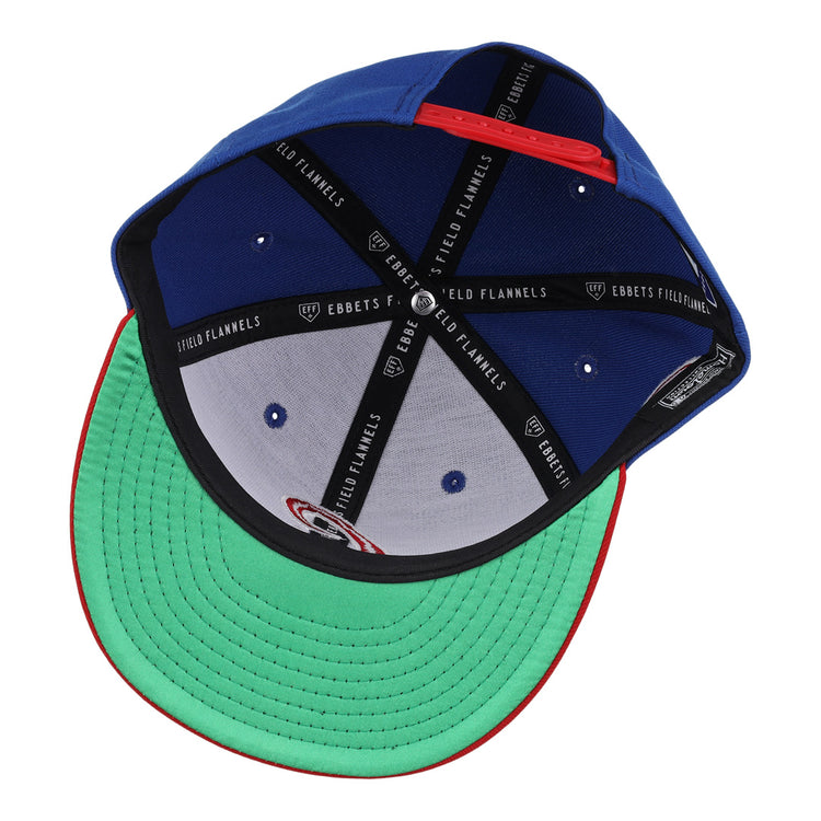 Inside view of the Havana Sugar Kings EFF MiLB Vintage Snapback by Ebbets Field Flannels, showing a green underbrim, red trim, black lining with brand label, and white and blue segments.