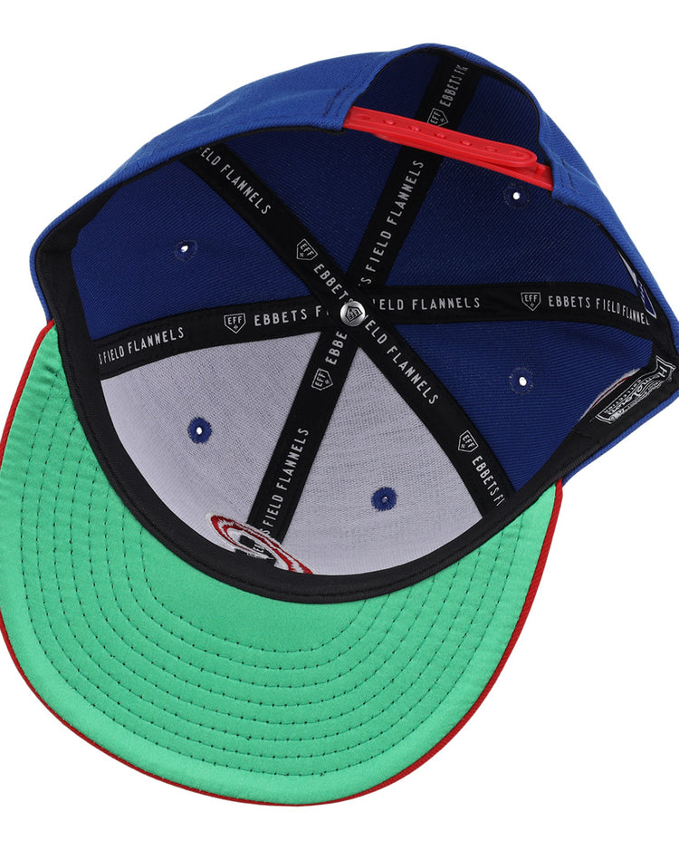 Inside view of the Havana Sugar Kings EFF MiLB Vintage Snapback by Ebbets Field Flannels, showing a green underbrim, red trim, black lining with brand label, and white and blue segments.