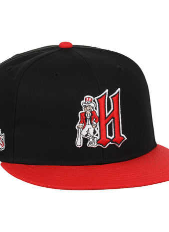 The Harrisburg Senators EFF MiLB Vintage Snapback by Ebbets Field Flannels features a black and red design, large red H with a cartoon character holding a bat, plus team logo on the side—perfect for vintage Minor League fans.