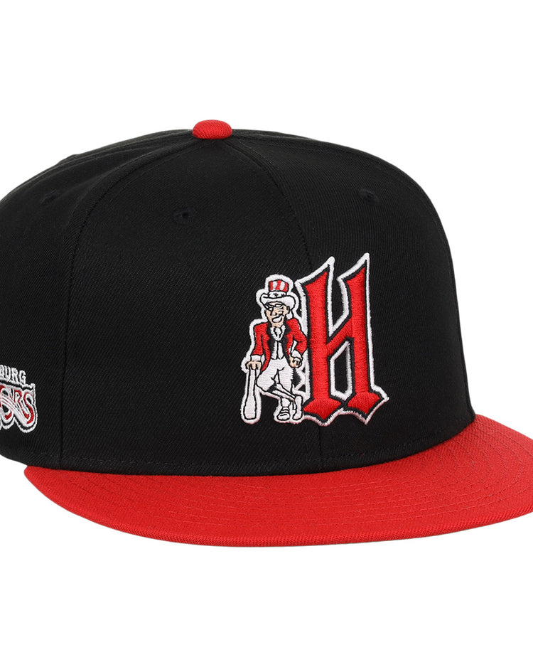 The Harrisburg Senators EFF MiLB Vintage Snapback by Ebbets Field Flannels features a black and red design, large red H with a cartoon character holding a bat, plus team logo on the side—perfect for vintage Minor League fans.