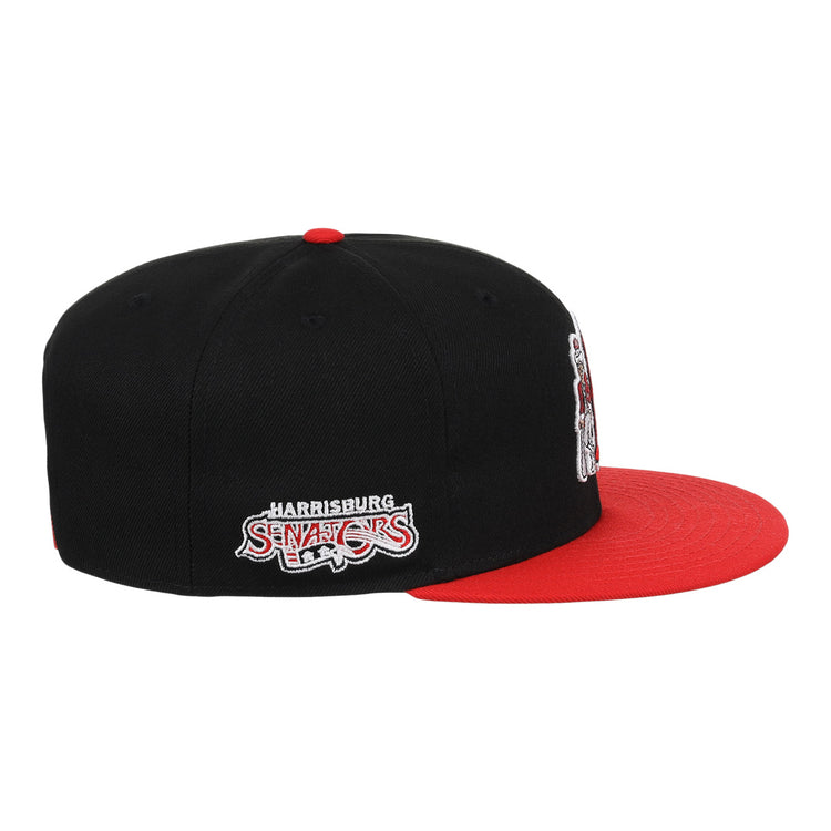 The Harrisburg Senators EFF MiLB Vintage Snapback by Ebbets Field Flannels is a black adjustable cap with a red brim and side-embroidered team logo—ideal for fans of vintage Minor League style.