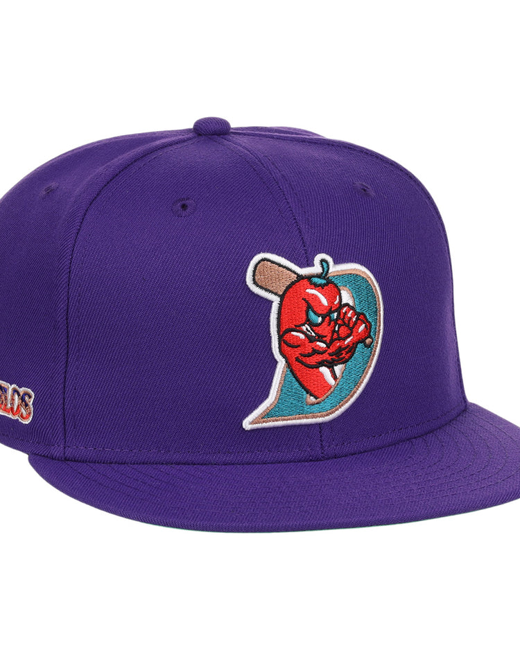 The El Paso Diablos EFF MiLB Vintage Snapback by Ebbets Field Flannels is a purple cap with an embroidered muscular red apple holding a bat and a stylized D, plus multicolored side text—part of the unique Vintage Minor League collection.