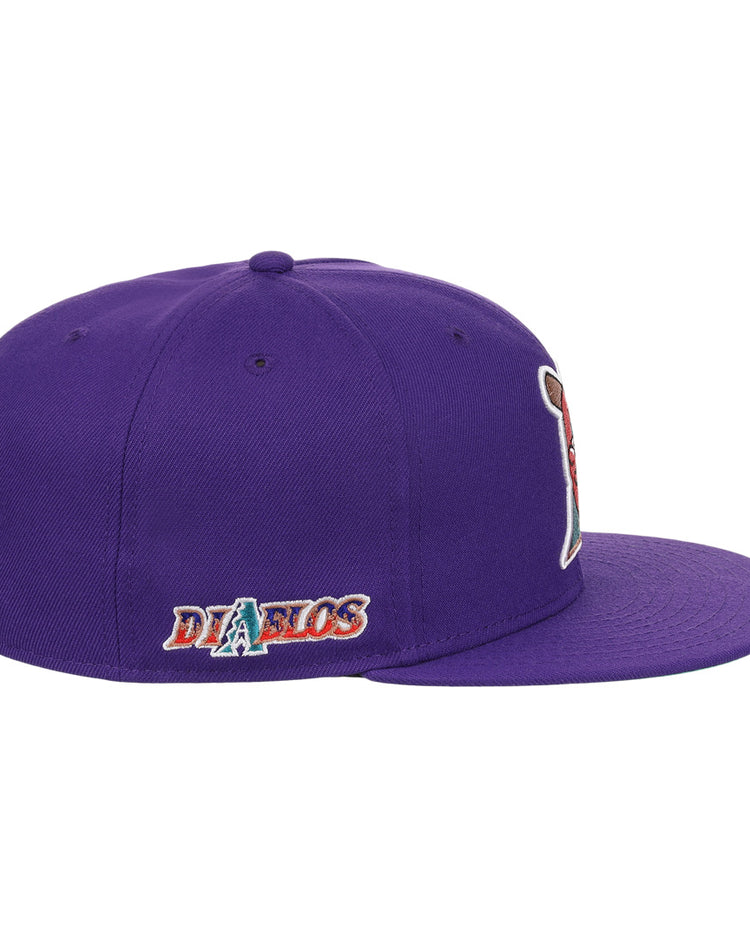 The El Paso Diablos EFF MiLB Vintage Snapback by Ebbets Field Flannels is a purple baseball cap with a flat brim, side view, small DIABLOS embroidered logo and stylized A near the back, plus ventilation eyelets.