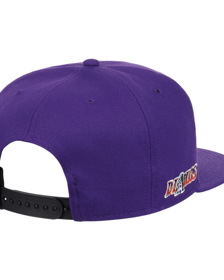 A purple El Paso Diablos EFF MiLB Vintage Snapback by Ebbets Field Flannels, seen from the back, with a black adjustable strap and a small team logo on the side, inspired by vintage minor league style.