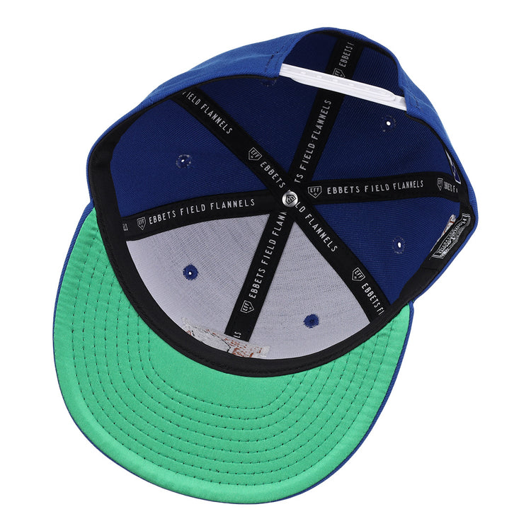A look inside the Durham Bulls EFF MiLB Vintage Snapback by Ebbets Field Flannels, featuring blue panels, a green undervisor, black Ebbets Field Flannels inner bands, and ventilation holes—a true vintage classic.