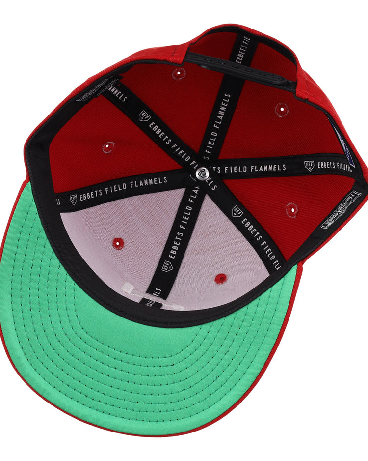 Inside view of the Ebbets Field Flannels Chattanooga Lookouts EFF MiLB Vintage Snapback shows black lining with “EBBETS FIELD FLANNELS” text, white stitching, green underbill, and an adjustable snapback closure.