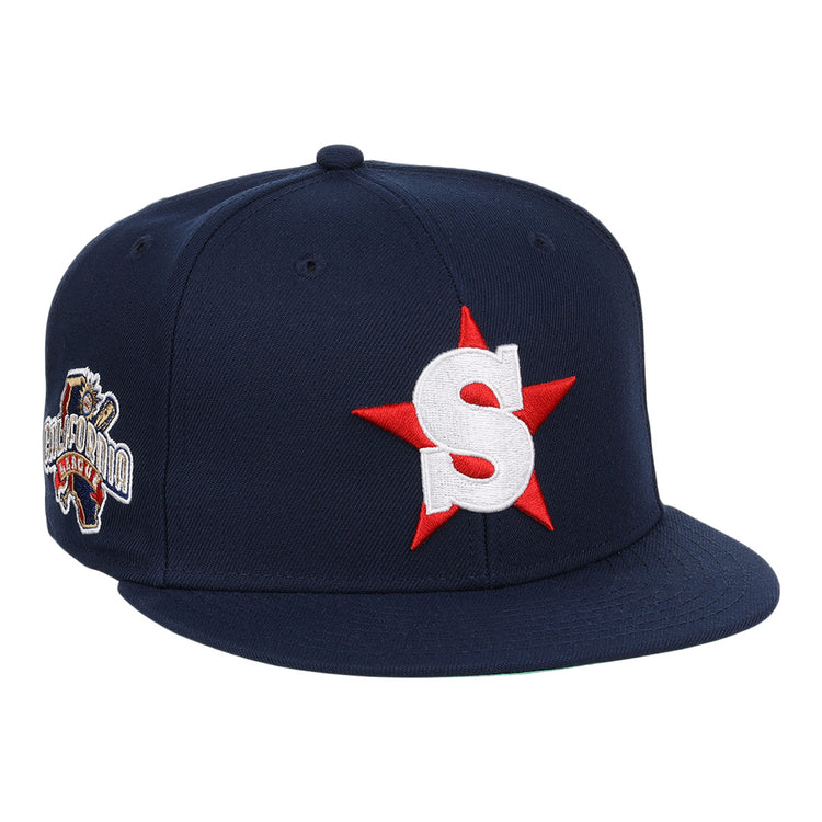 The Ebbets Field Flannels San Bernardino Spirit EFF MiLB Vintage Snapback is a navy cap featuring a large white S with a red star on the front, inspired by the Vintage Minor League team, plus an embroidered California bear patch on the side.