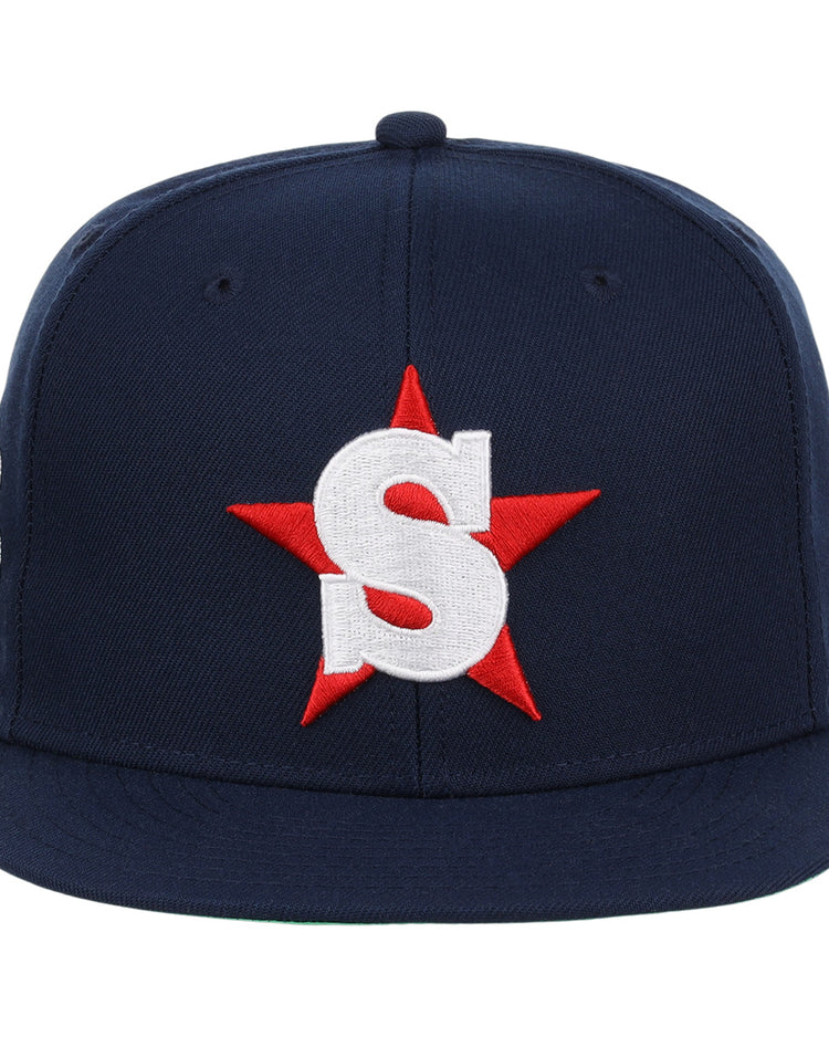 The San Bernardino Spirit EFF MiLB Vintage Snapback by Ebbets Field Flannels is a navy cap with a red star and bold white S on the front, inspired by the classic California League team.
