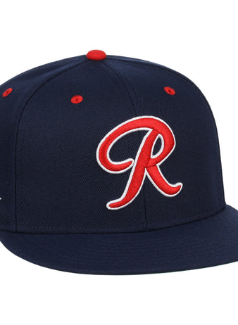 The Seattle Rainiers EFF MiLB Vintage Snapback by Ebbets Field Flannels features navy blue wool, a red and white R front logo, red accents, and a mountains patch—honoring the Pacific Coast Leagues legacy.