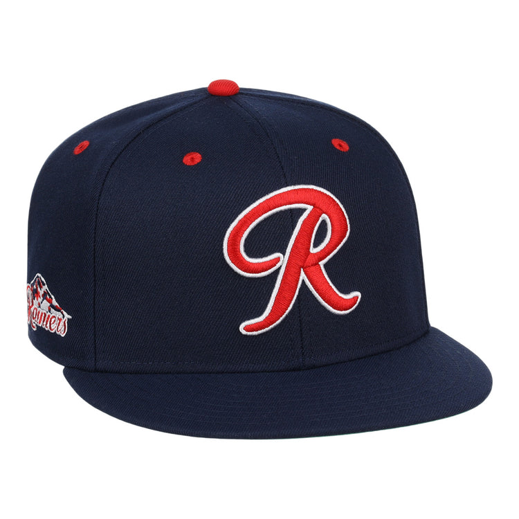 The Seattle Rainiers EFF MiLB Vintage Snapback by Ebbets Field Flannels features navy blue wool, a red and white R front logo, red accents, and a mountains patch—honoring the Pacific Coast Leagues legacy.