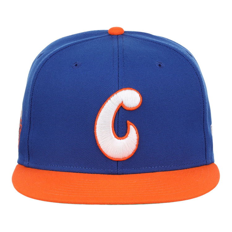 The Ebbets Field Flannels Charlotte Orioles EFF MiLB Vintage Snapback features a blue crown, orange brim, and a large white-and-orange C embroidered on the front.