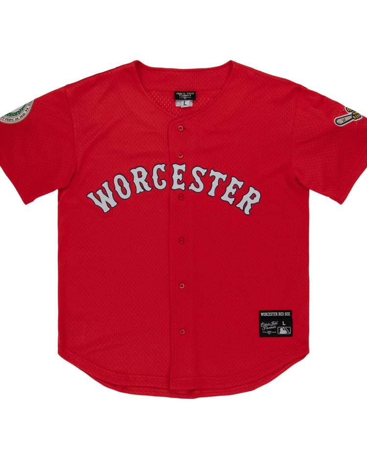 The EFF Worcester Red Sox MiLB Button Down Jersey features a red design inspired by Negro League jerseys, gray Worcester across the chest, black front buttons, and patches on the sleeves and lower left hem.