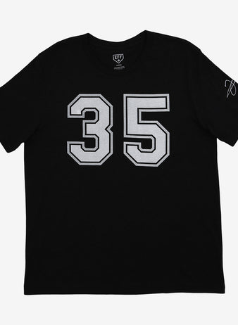 The Ebbets Field Flannels Frank Thomas Hall of Fame T-Shirt—black with large white 35 on the front—features a signature and colorful patch graphic on the left sleeve, inspired by Chicago White Sox legend Frank Thomas.