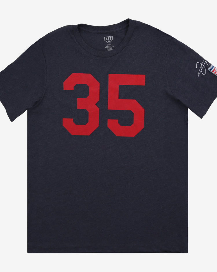 The Ebbets Field Flannels Frank Thomas Hall of Fame T-Shirt in navy features a bold red 35 on the front, honoring the White Sox legend, with his signature and an American flag patch on the left sleeve.