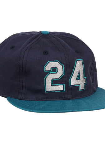 The Ebbets Field Flannels Ken Griffey Jr. 1995 Signature Series Ballcap is navy blue with a teal brim and button, and features the number 24 stitched in white and teal on the front.