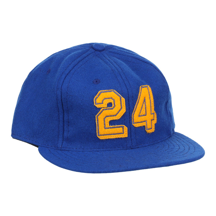 The Ebbets Field Flannels Ken Griffey Jr. 1989 Signature Series Ballcap is a blue vintage wool cap with a curved brim, visible panel stitching, and bold yellow 24 on the front, inspired by classic Griffey Jr. styles.