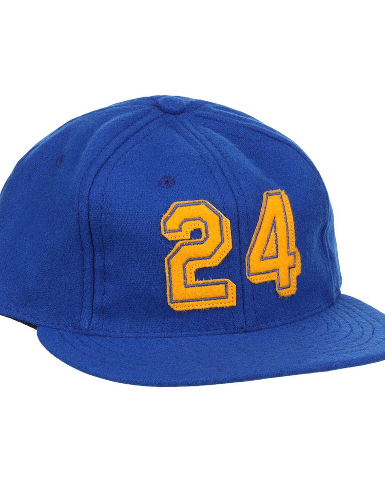 The Ebbets Field Flannels Ken Griffey Jr. 1989 Signature Series Ballcap is a blue vintage wool cap with a curved brim, visible panel stitching, and bold yellow 24 on the front, inspired by classic Griffey Jr. styles.