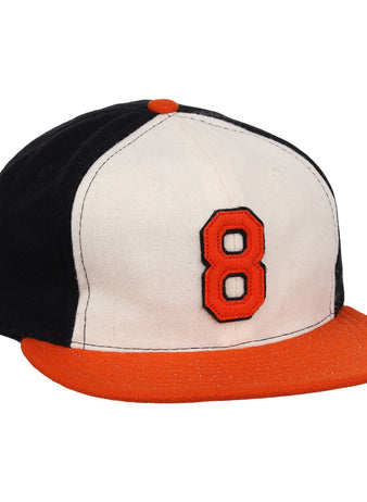 The Ebbets Field Flannels Cal Ripken Jr. Signature Series Ballcap features a vintage design with a black back, white front, orange brim and button, plus a bold orange number 8 outlined in black as tribute to Cal Ripken Jr.