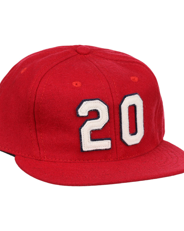 The Lou Brock Signature Series Ballcap by Ebbets Field Flannels is a vintage red wool flat-brim cap, featuring the number 20 in white with black outline on the front—a timeless tribute to the Hall of Famer.