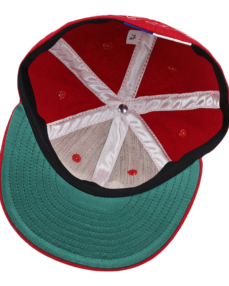 Top view inside the Lou Brock Signature Series Ballcap by Ebbets Field Flannels, featuring a green underbrim, white inner seams, red stitching, and a small size tag near the back.