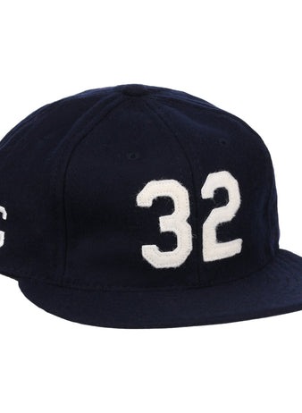 The Buck Leonard Signature Series Ballcap by Ebbets Field Flannels is a vintage navy wool cap with bold white 32 on the front and a white G on the side, honoring Buck Leonard’s legacy in the Negro Leagues.