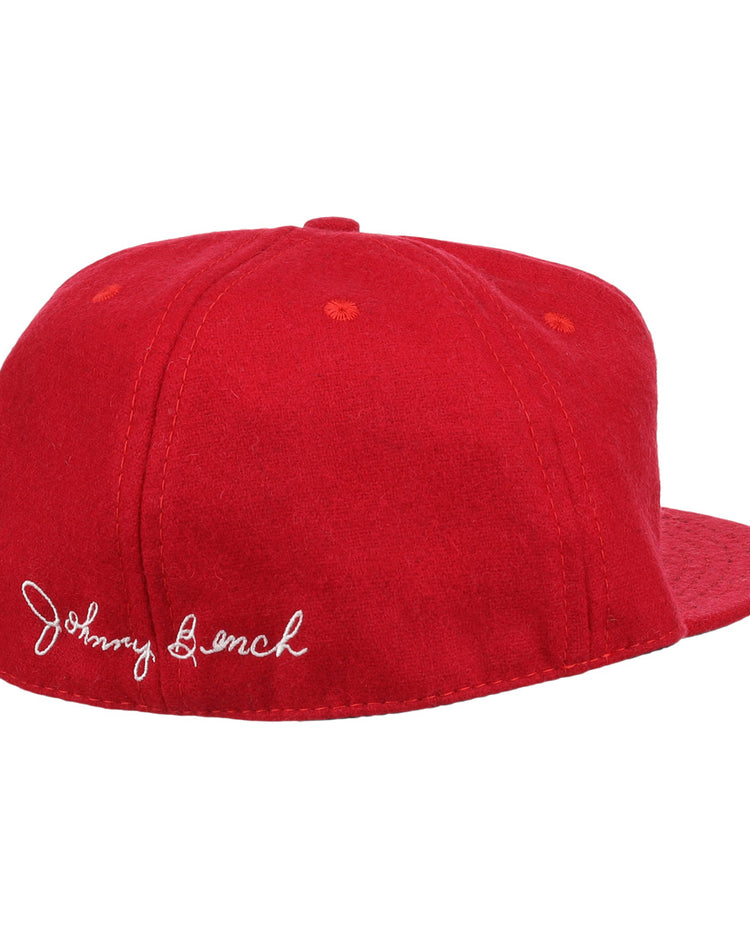 The Johnny Bench Signature Series Ballcap by Ebbets Field Flannels is a bright red vintage wool cap with a flat brim and white cursive Johnny Bench signature embroidered on the back left, featuring no front logos.