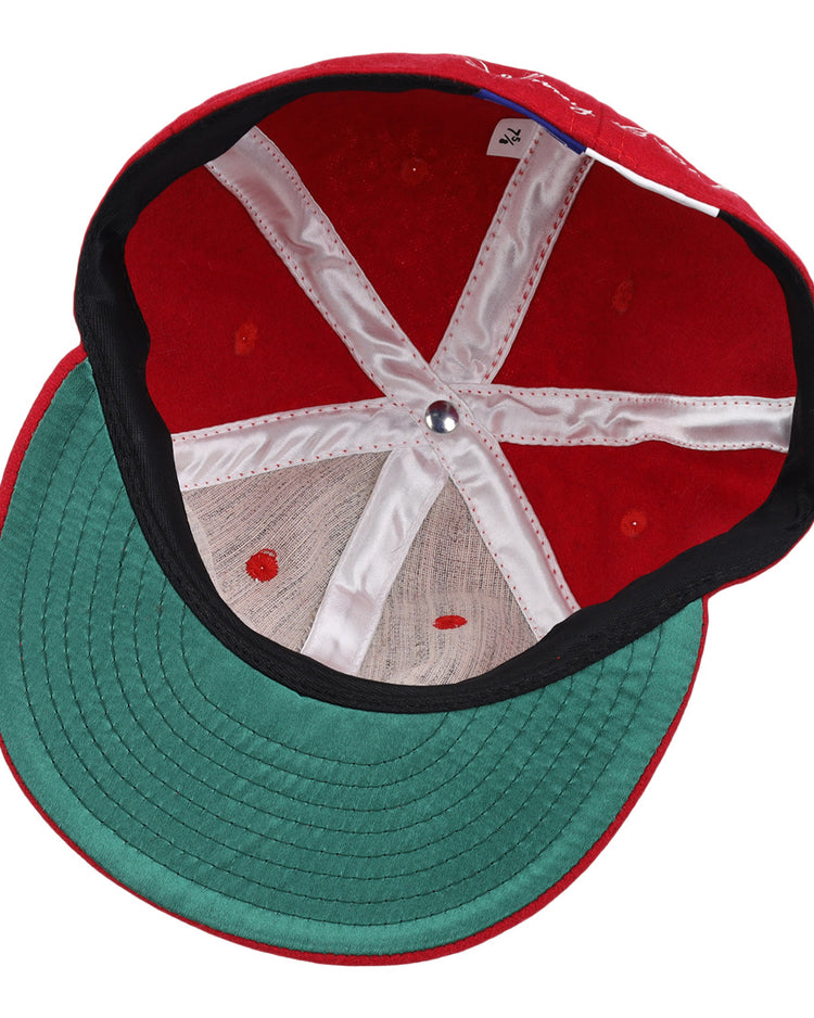 The underside of the Johnny Bench Signature Series Ballcap by Ebbets Field Flannels features a green brim, interior stitching, white support bands, and a metal center button—evoking classic ballcaps of legendary Hall of Fame players.