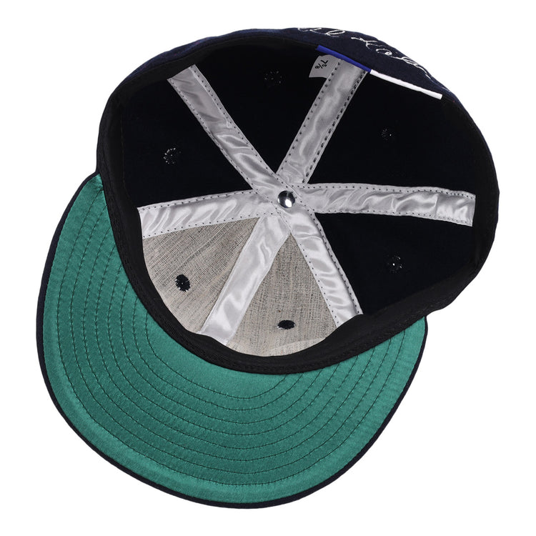 Top-down view of the Al Kaline Signature Series Ballcap by Ebbets Field Flannels, featuring silver inner seams, a green underbrim, and classic black and grey wool—reminiscent of caps in the National Baseball Hall of Fame.