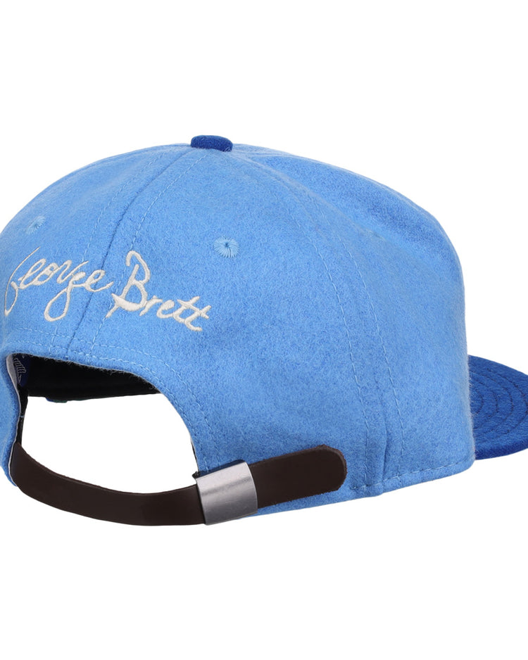 The George Brett Signature Series Ballcap by Ebbets Field Flannels is a light blue vintage wool hat with white embroidered George Brett on the back and an adjustable strap—honoring the National Baseball Hall of Fame legend.