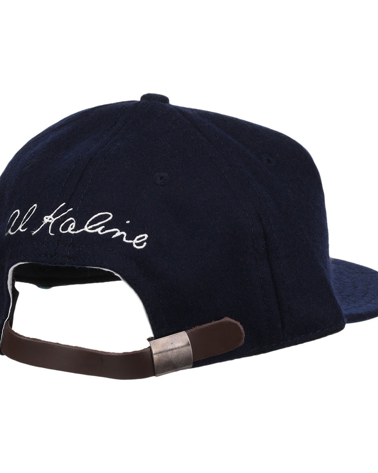 The Al Kaline Signature Series Ballcap by Ebbets Field Flannels is a navy vintage wool cap seen from the back, featuring white cursive embroidery and an adjustable brown leather strap with metal clasp.
