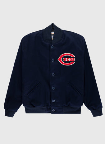The EFF Cincinnati Reds 1942 Authentic All Wool Varsity Jacket features a navy design with ribbed cuffs and hem, button-up front, slanted pockets, and a large red and white C patch with REDS on the chest, inspired by vintage Reds style.