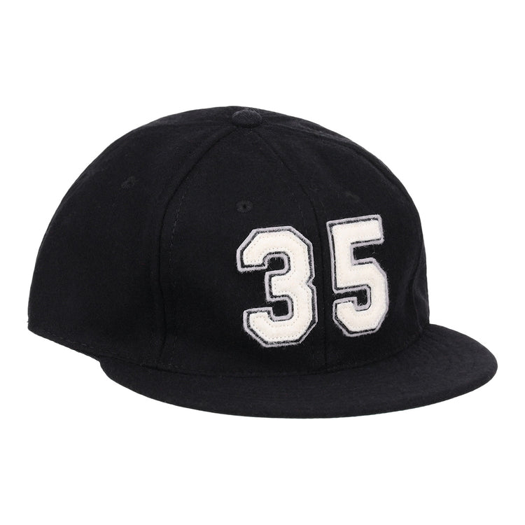 The Frank Thomas Signature Series Ballcap by Ebbets Field Flannels is a black vintage wool cap with a bold white 35 on the front—ideal for National Baseball Hall of Fame fans.